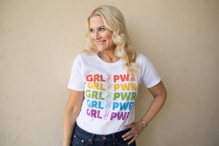 brand coach and strategist Liz Dennery Sanders wearing girl power t-shirt promoting her brand camp summer intensive helping women create their brand copy, social media presence, refine their offerings, develop their call to action and list building email marketing system and create their autoresponder series