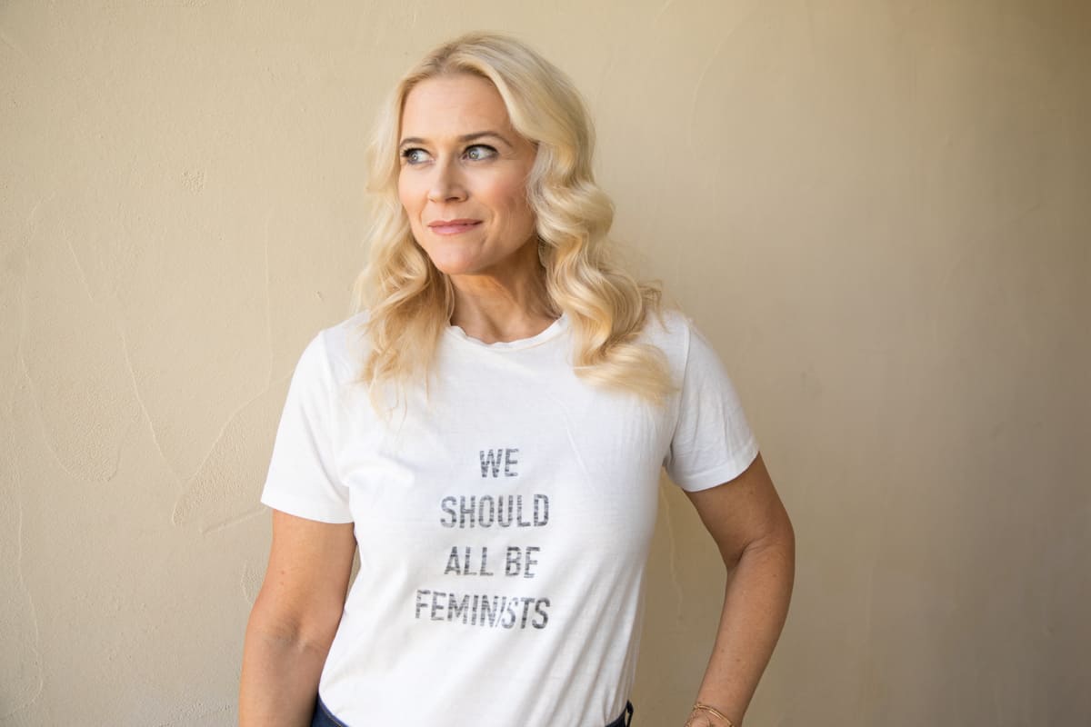 How to Build a Lighthouse Brand Identity - Liz wearing we should all be feminists shirt